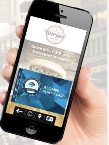 Hand holding a cell phone with the VIU alumni perks app loaded onto it.